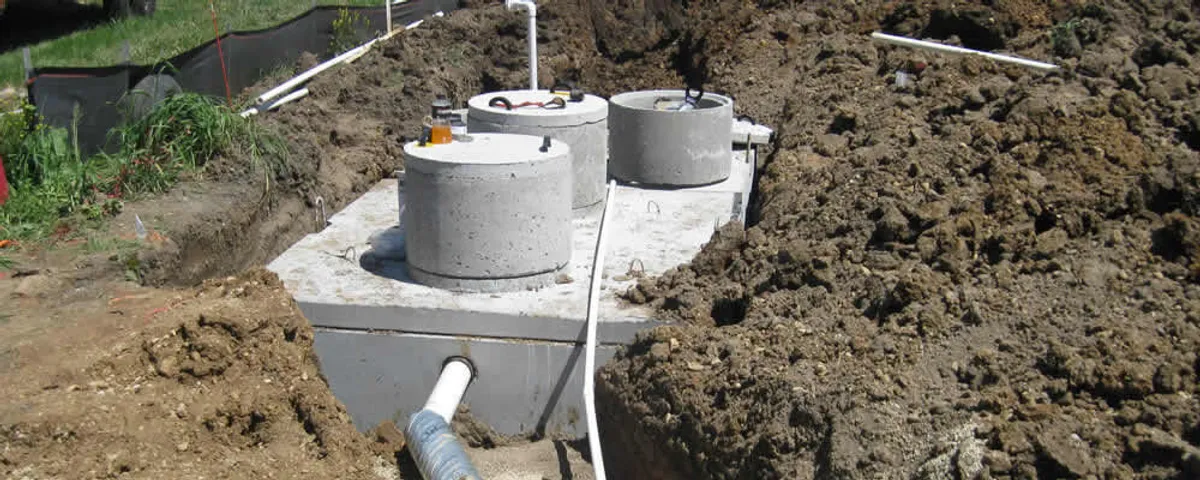 Septic system repair and installation site with tank access ports in Chico, CA