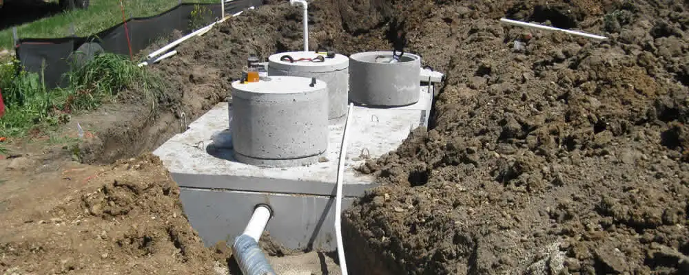 Septic system repair and installation site with tank access ports in Chico, CA
